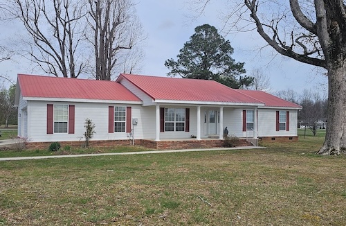 Why Do Dark Stains Keep Appearing on Your Roof? Thumbnail
