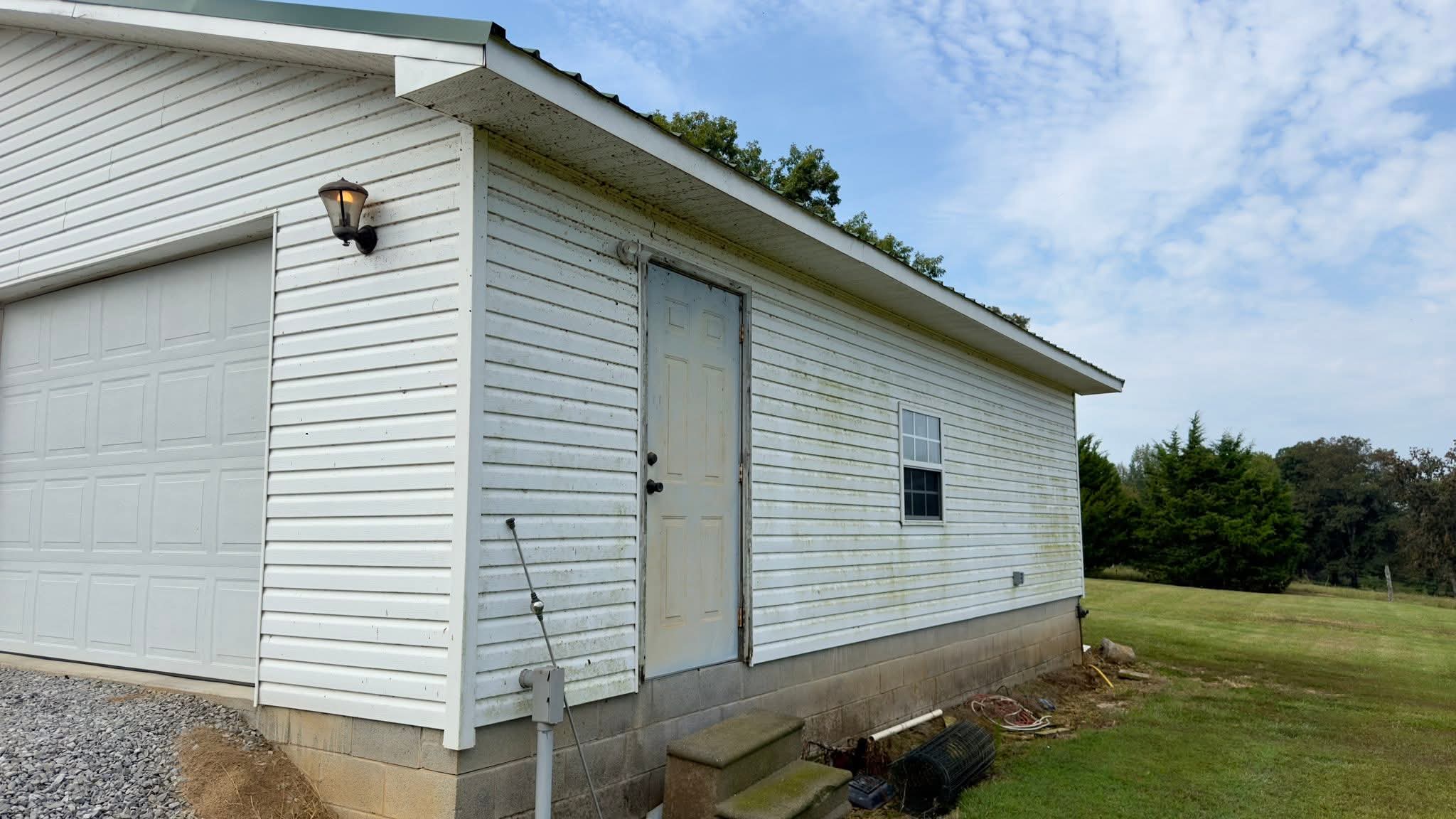 Soft Wash Turnaround: Algae-Covered Garage Revived in Bonnertown, TN Thumbnail